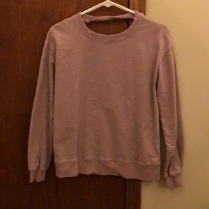 purple sweatshirt with cross back